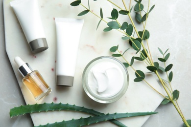 Photo of Flat lay composition with different body care products on table