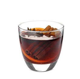 Photo of Glass of mulled wine with spices isolated on white