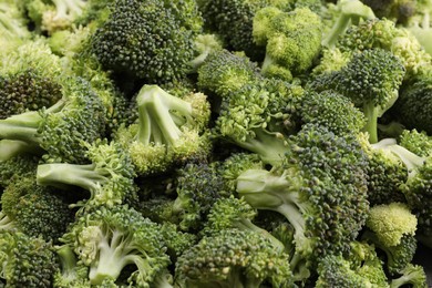 Photo of Fresh raw broccoli as background, closeup view