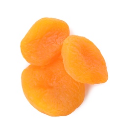 Photo of Tasty apricots on white background, top view. Dried fruit as healthy food