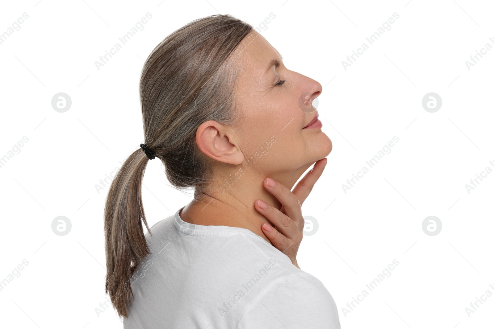 Photo of Beautiful woman touching her neck on white background