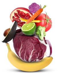 Stack of different vegetables and fruits isolated on white