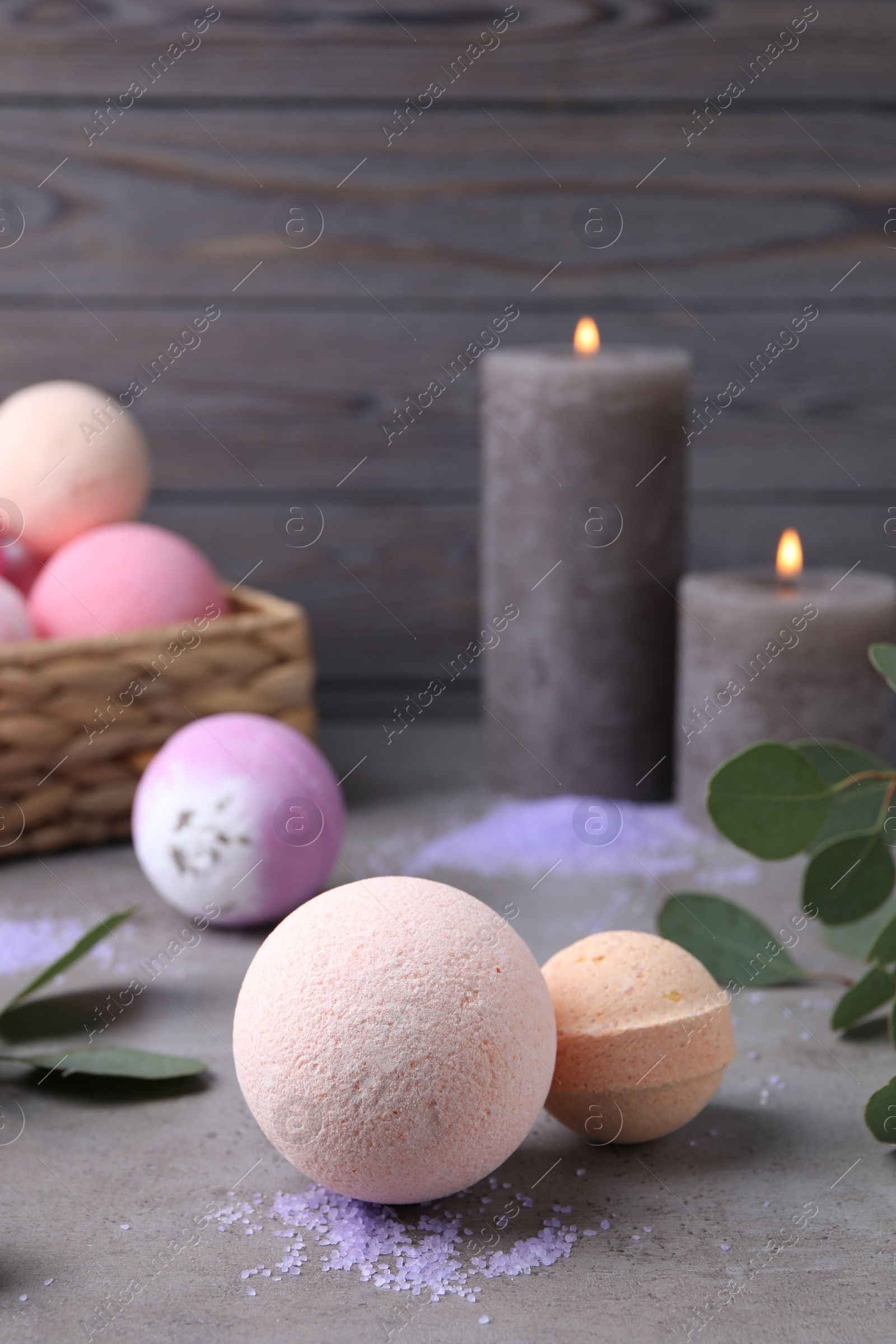 Photo of Beautiful composition with aromatic bath bombs on grey table