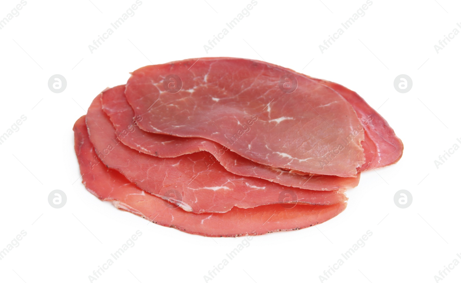 Photo of Slices of tasty bresaola isolated on white