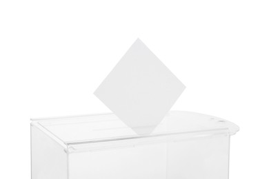 Photo of Transparent ballot box with vote isolated on white