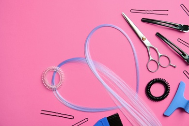 Flat lay composition with hair salon tools on color background