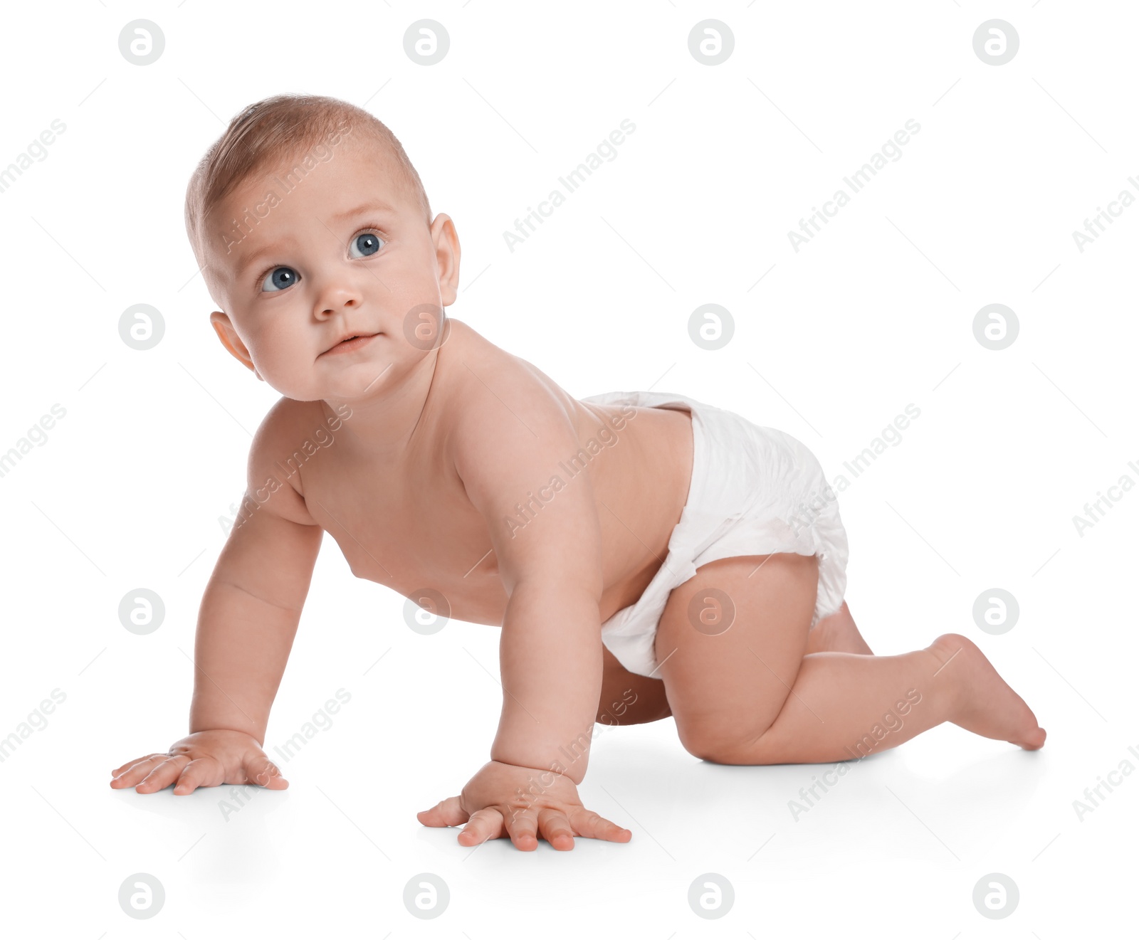 Photo of Cute little baby in diaper crawling on white background