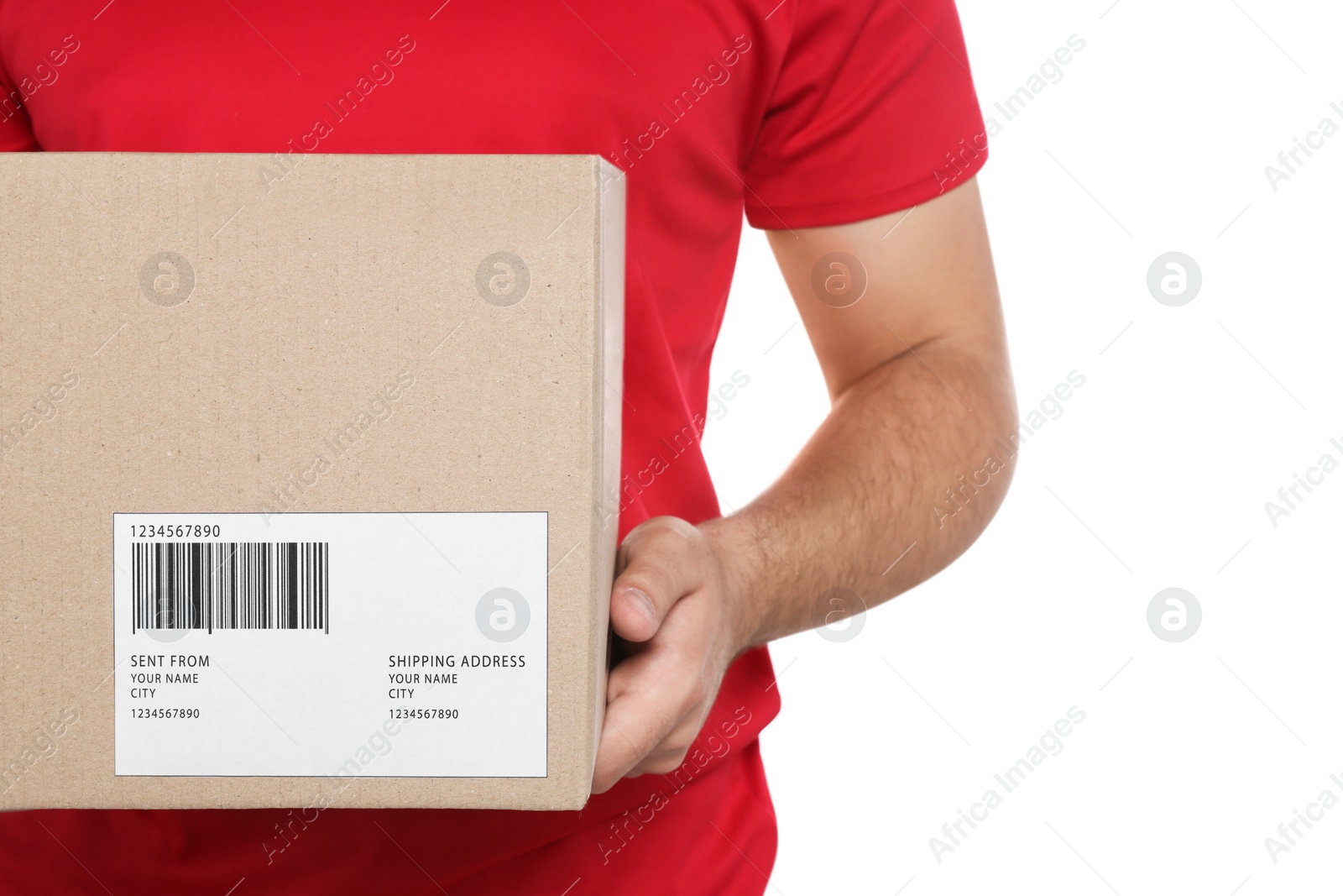 Photo of Courier holding cardboard box on white background, closeup