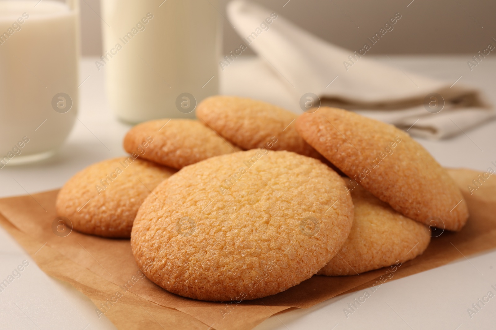 Photo of Delicious Danish butter cookies on white table, closeup