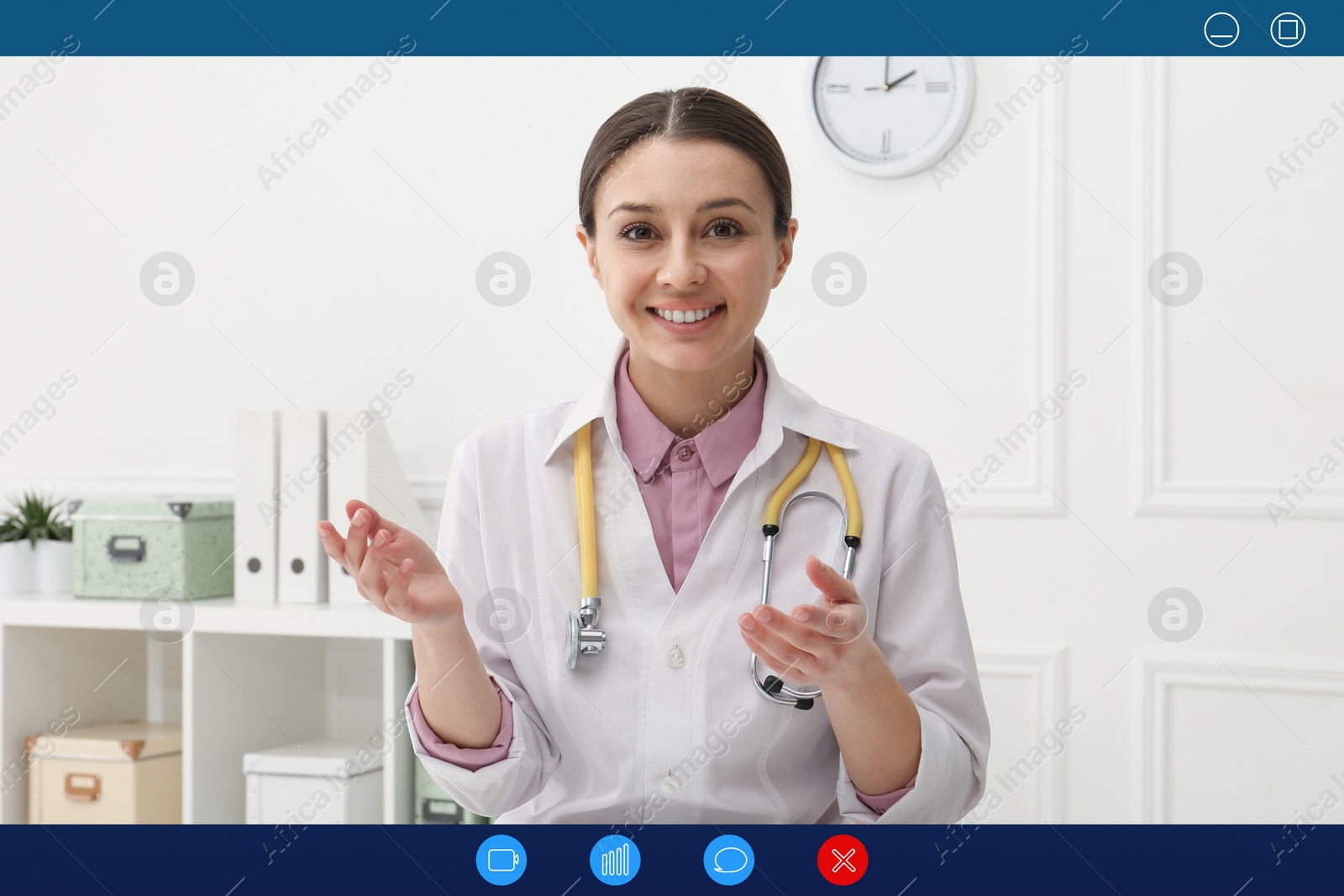 Image of Pediatrician consulting patient online using video chat in clinic, view from webcam