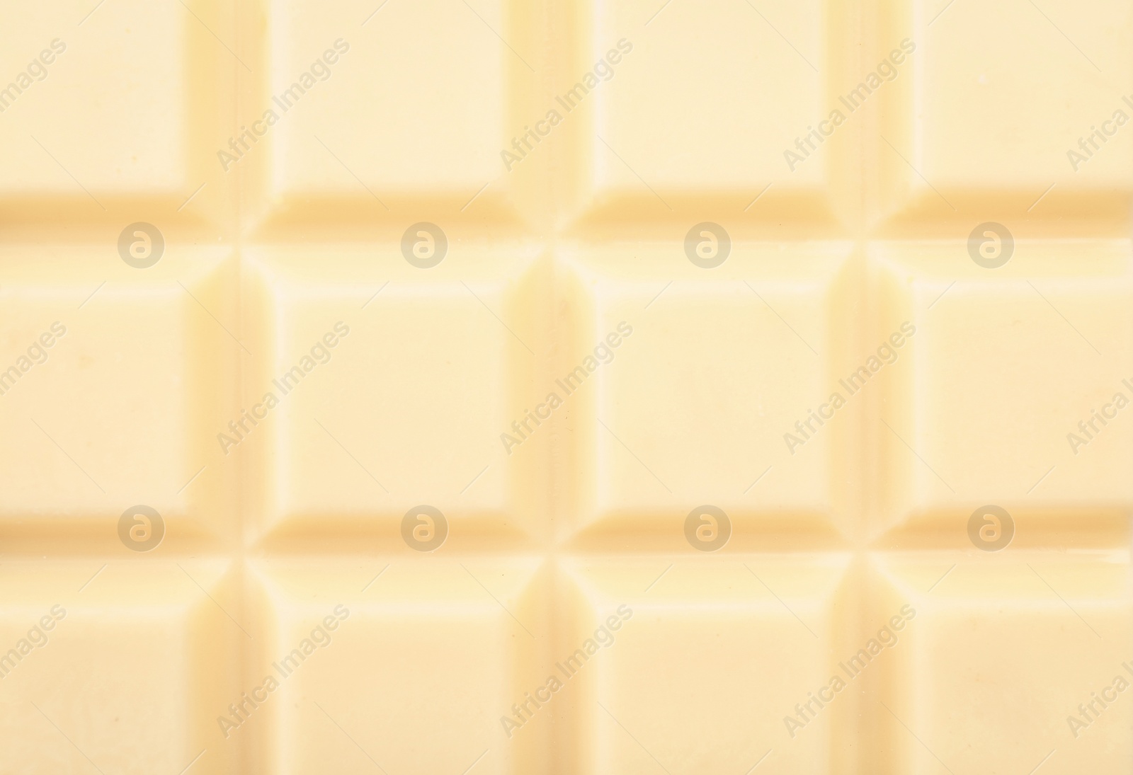 Photo of Delicious white chocolate bar as background