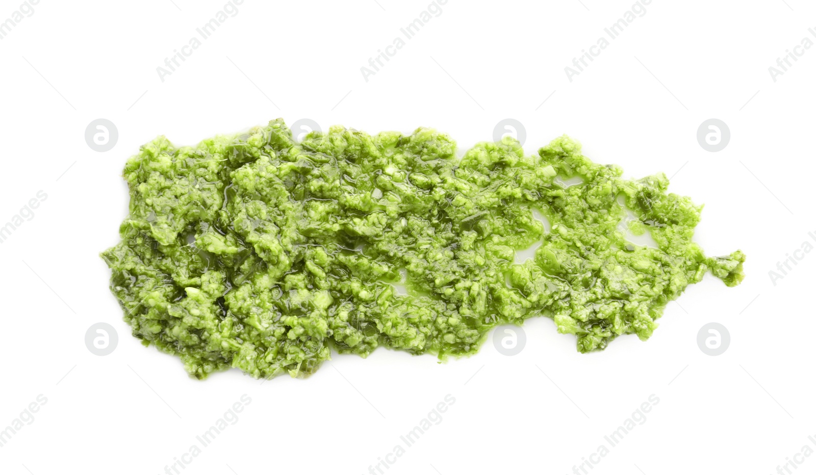 Photo of Tasty pesto sauce isolated on white, top view