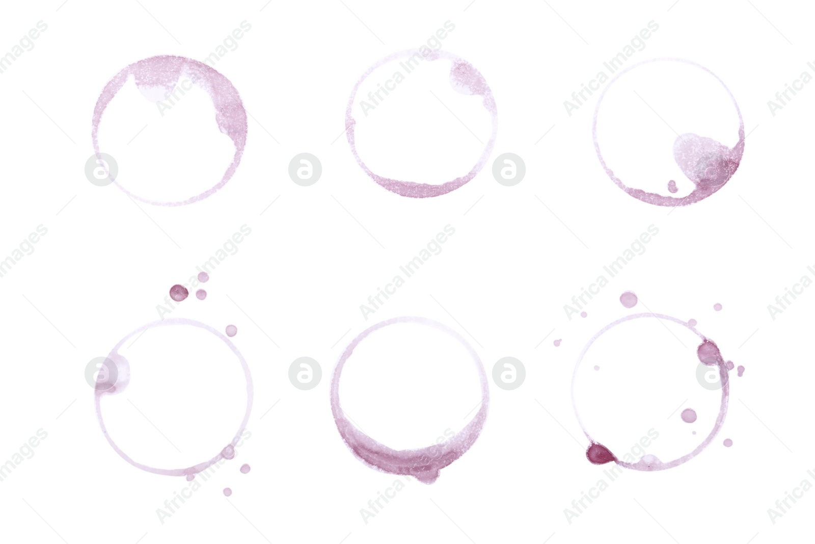 Photo of Many wine rings and drops on white background, top view