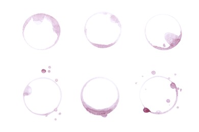 Photo of Many wine rings and drops on white background, top view