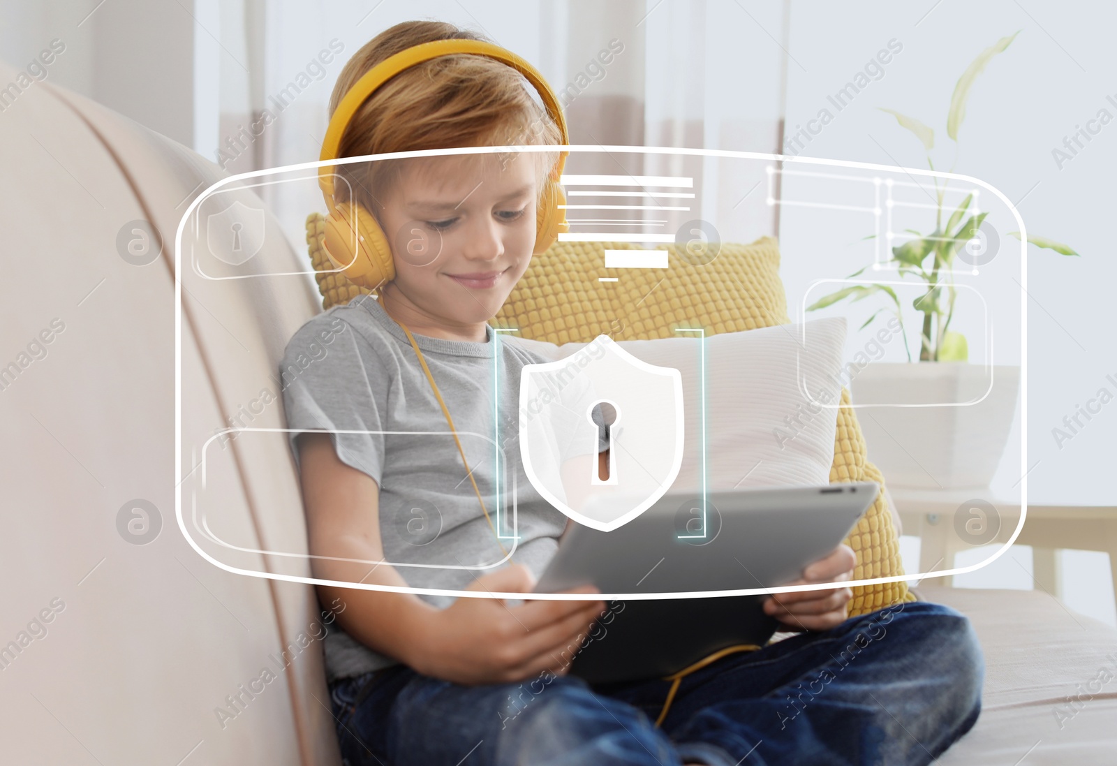 Image of Child safety online. Little boy using tablet at home. Illustration of internet blocking app on foreground