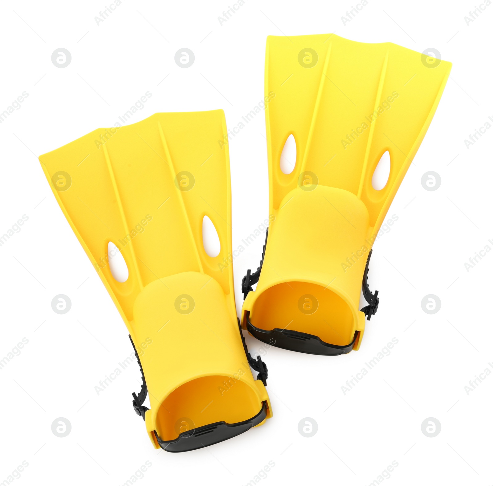 Photo of Pair of yellow flippers on white background, top view