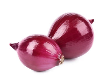 Photo of Fresh whole red onions on white background