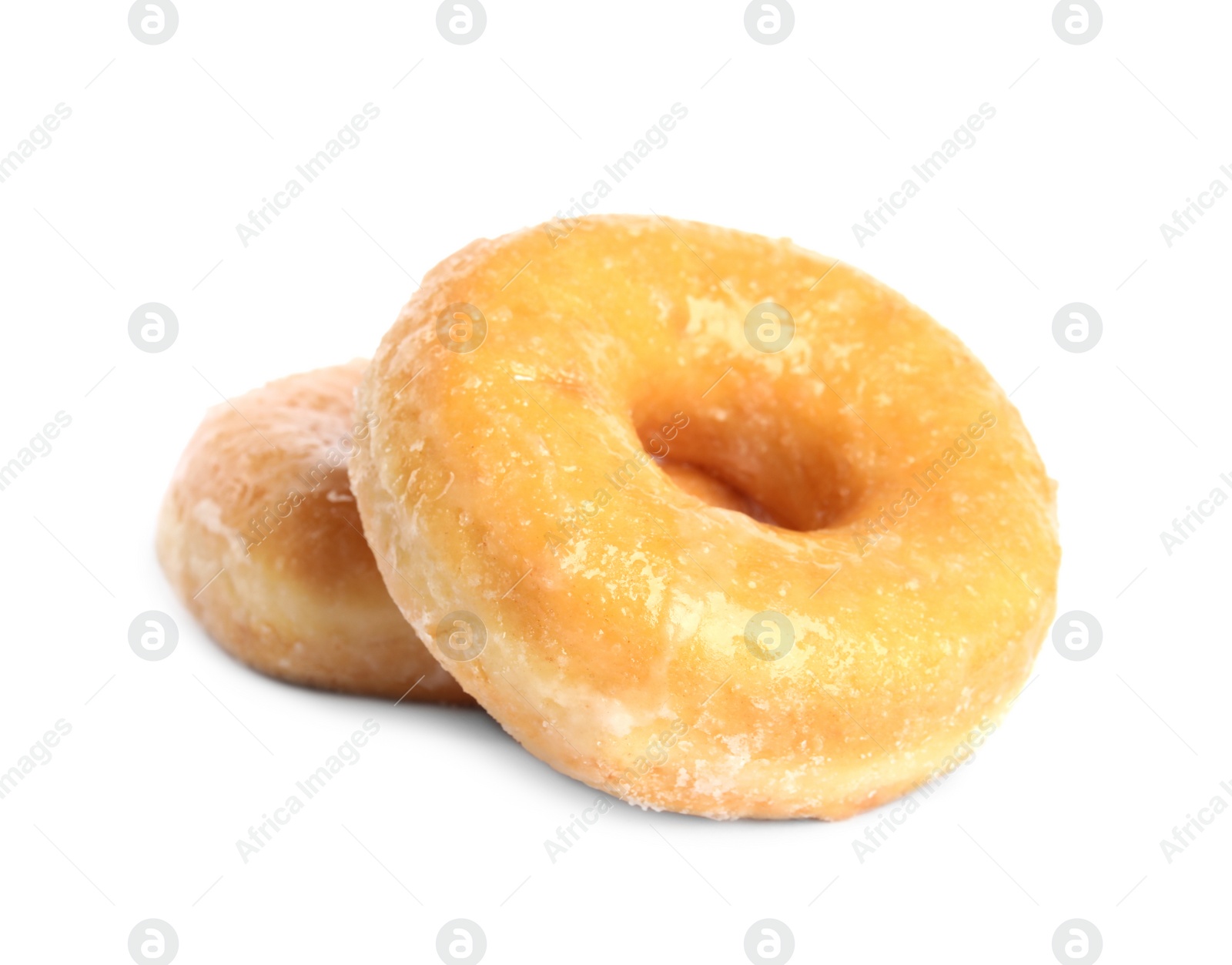 Photo of Sweet delicious glazed donuts on white background