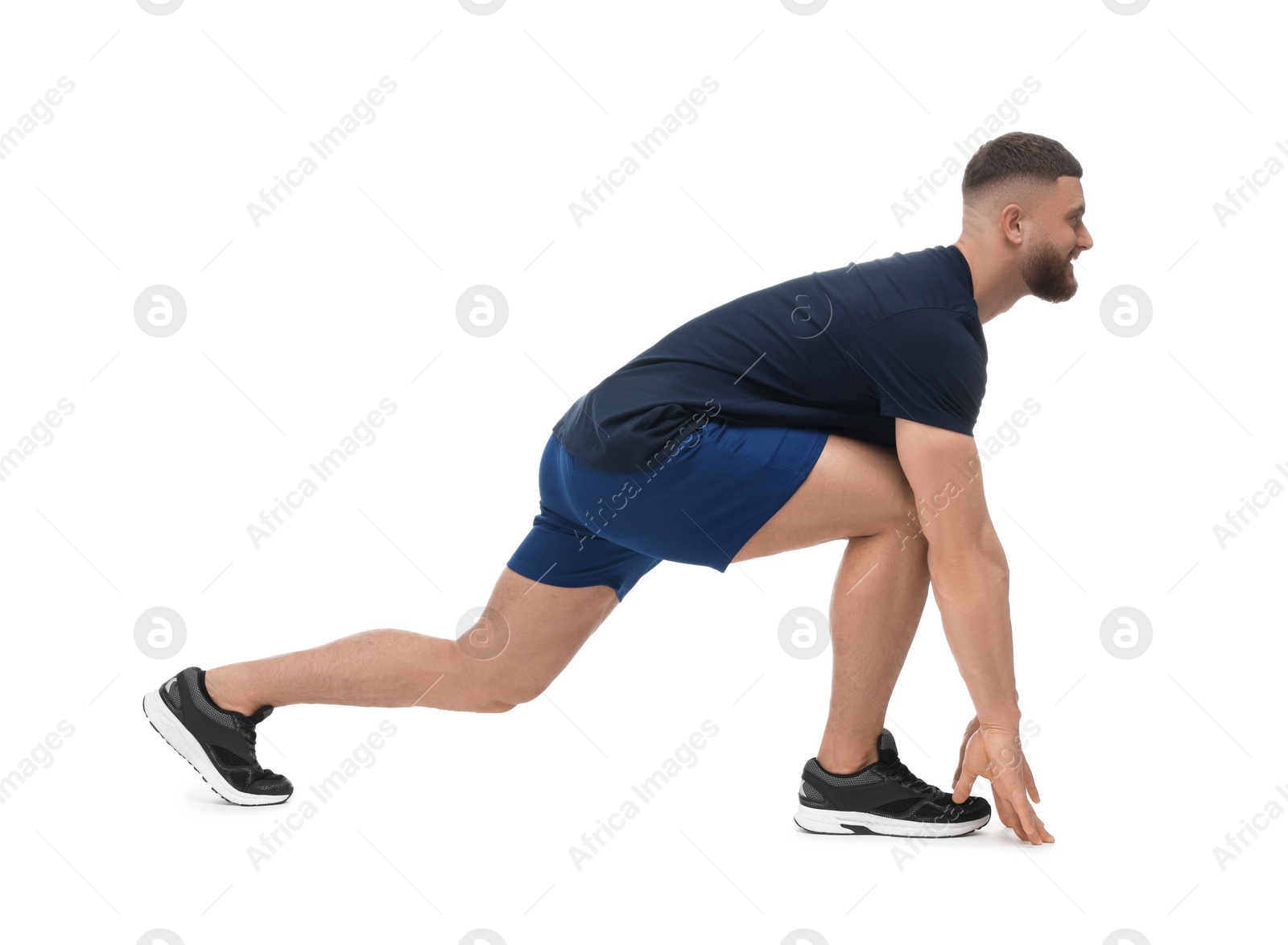 Photo of Man doing stretching on white background. Morning exercise