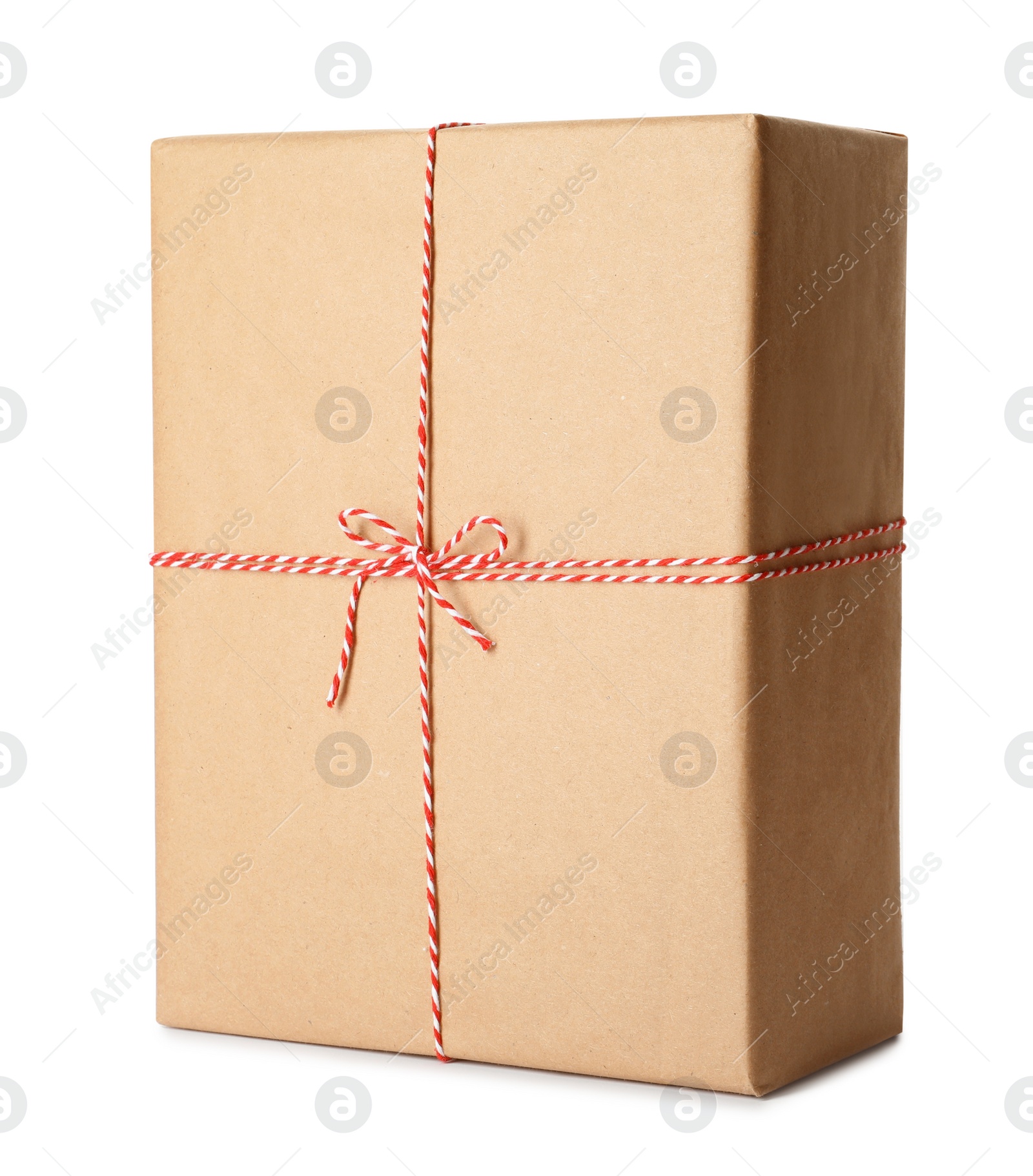 Photo of Gift box wrapped in kraft paper with bow isolated on white