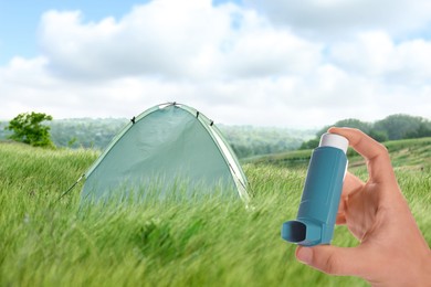 Image of Man with asthma inhaler in green field, closeup. Emergency first aid during outdoor recreation