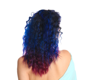 Young woman with bright dyed hair on white background, back view