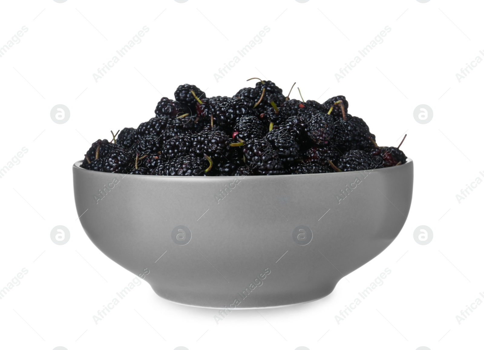 Photo of Bowl of delicious ripe black mulberries isolated on white