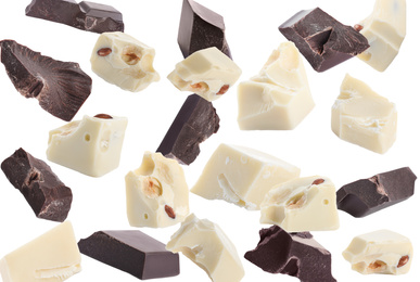 Image of Delicious chocolate chunks falling on white background