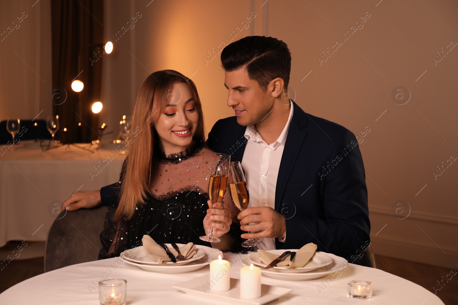 Photo of Lovely couple having romantic dinner in restaurant