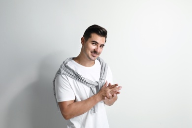 Photo of Portrait of handsome young man on white background