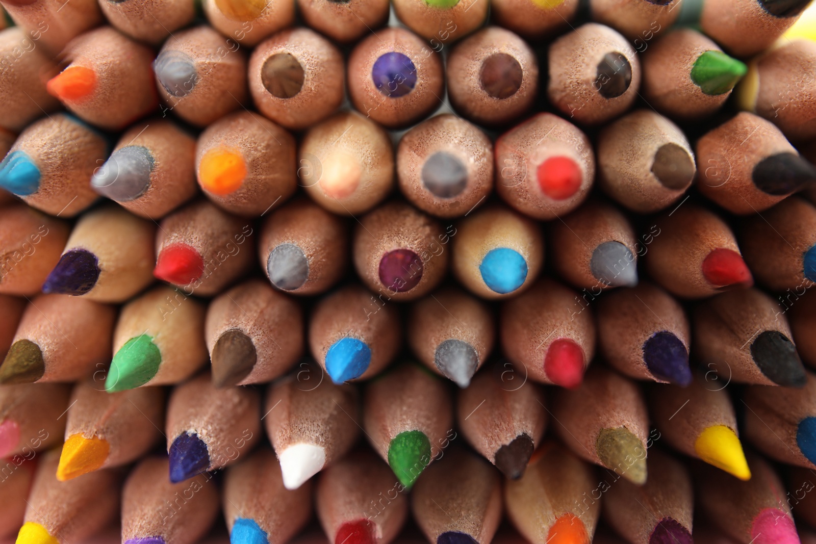 Photo of Different color pencils as background, top view