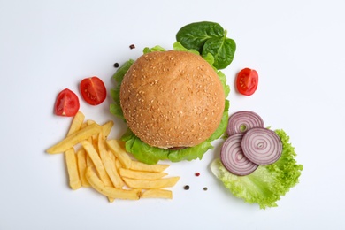 Photo of Composition with burger and french fries on white background