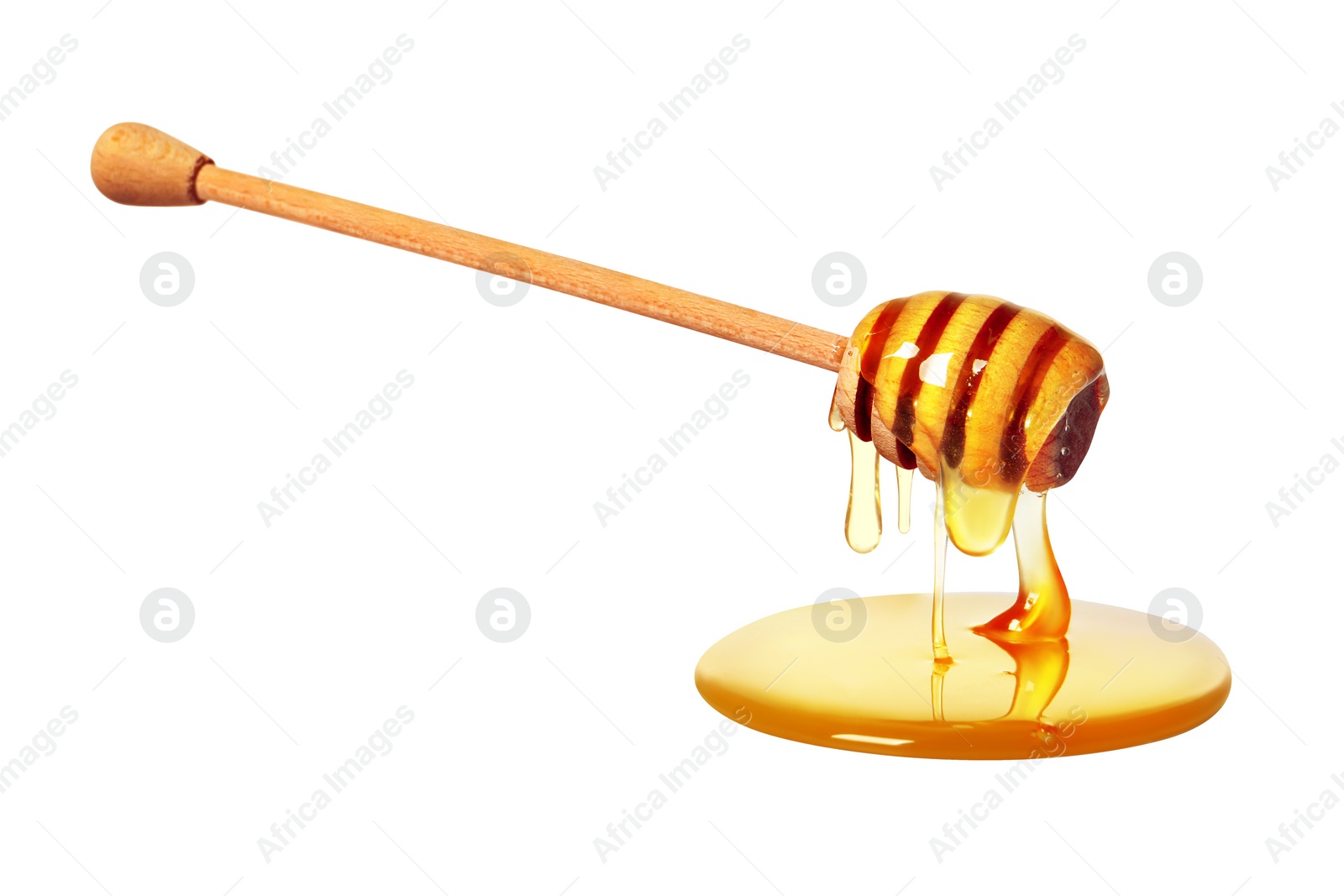 Image of Natural honey dripping from dipper on white background