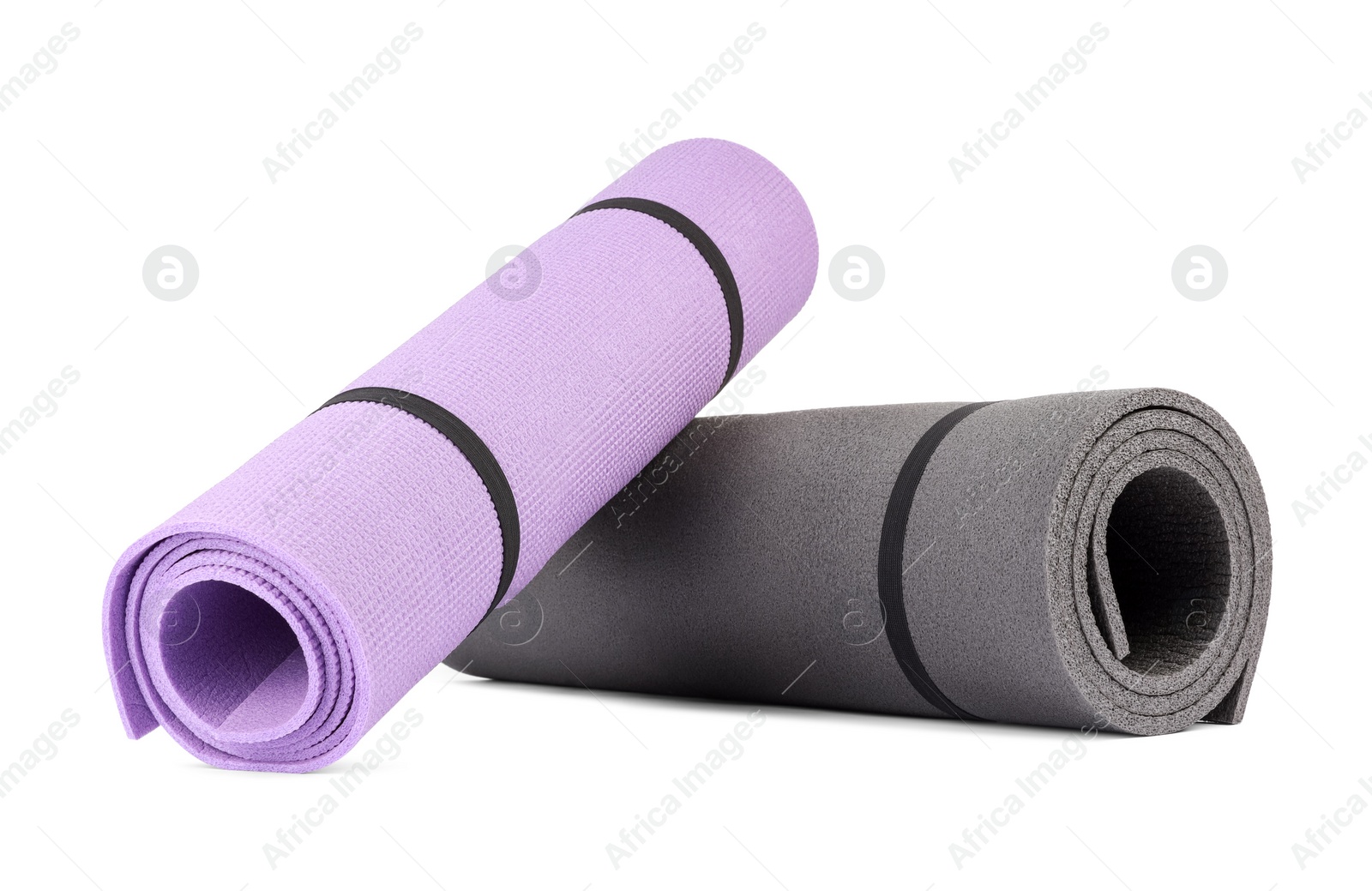 Photo of Grey and violet fitness mat isolated on white. Sports equipment