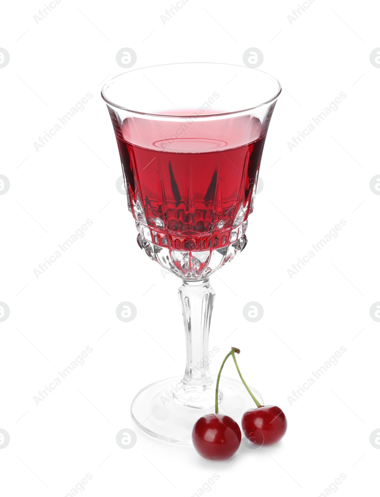 Photo of Delicious cherry wine with ripe juicy berries isolated on white