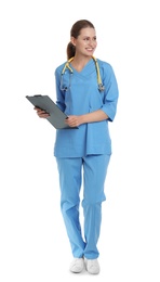 Full length portrait of young medical assistant with stethoscope and clipboard on white background