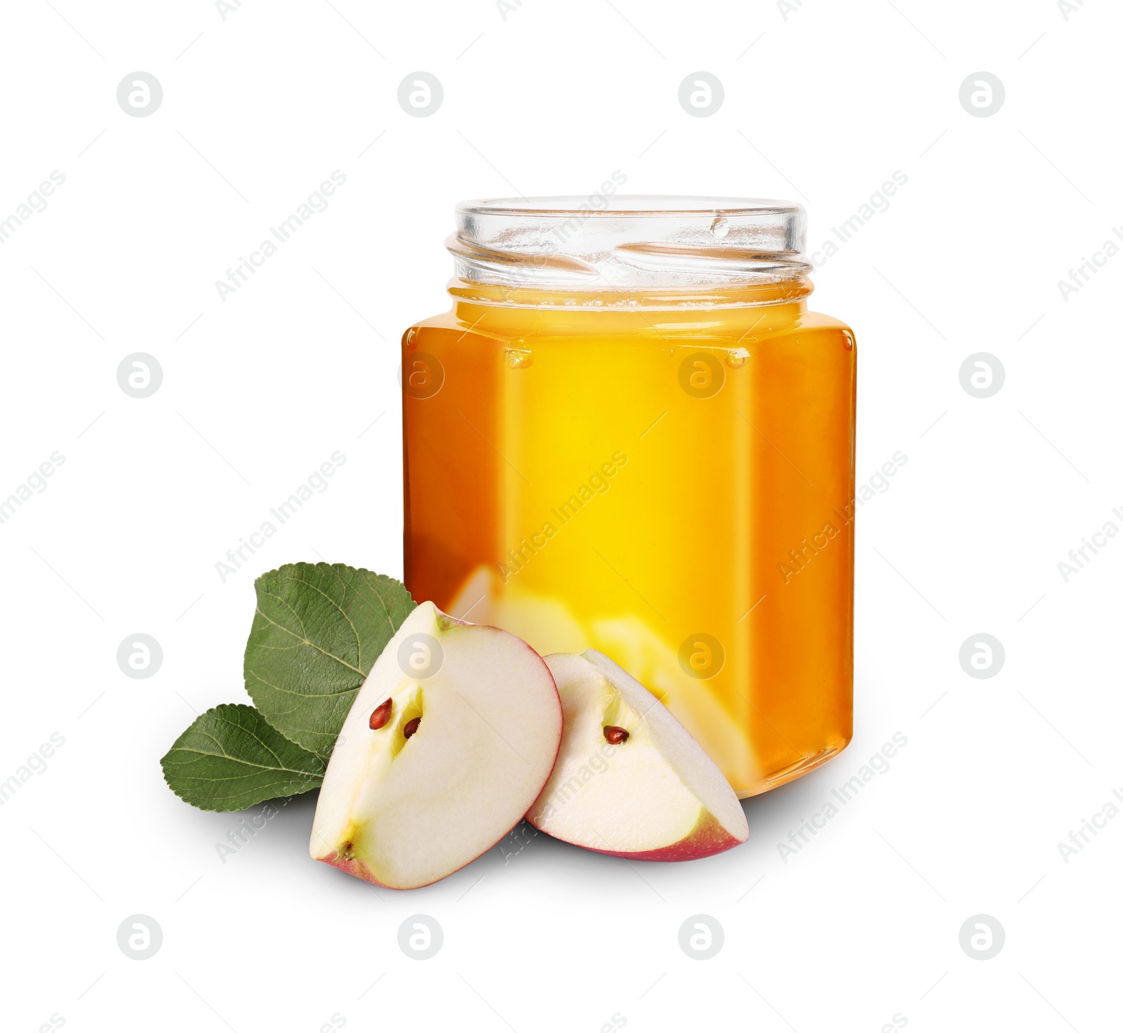 Image of Honey in glass jar and cut apple isolated on white