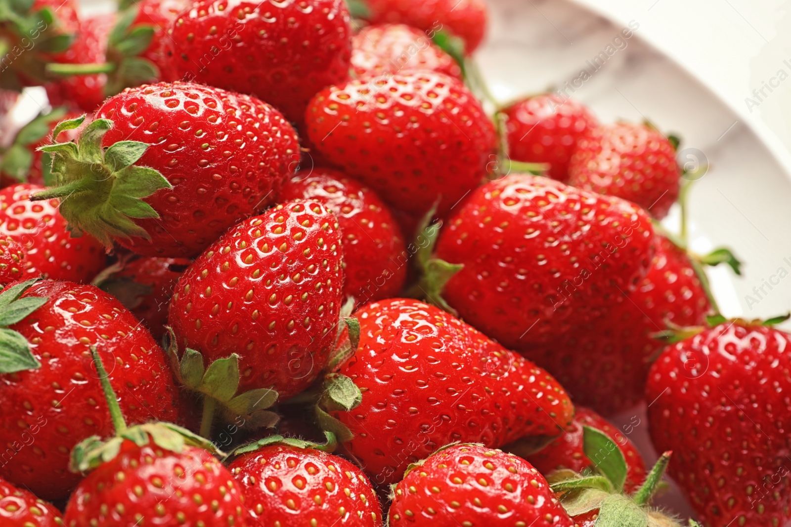 Photo of Fresh ripe strawberries, closeup. Healthy diet