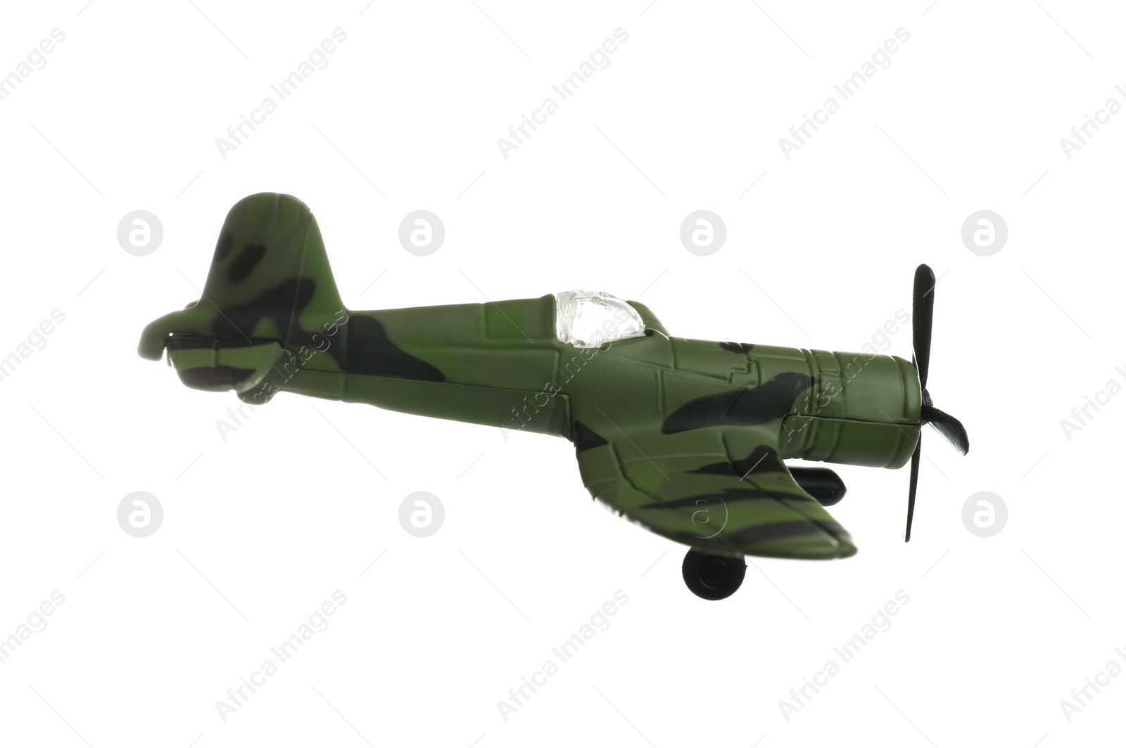 Photo of Vintage toy military airplane on white background