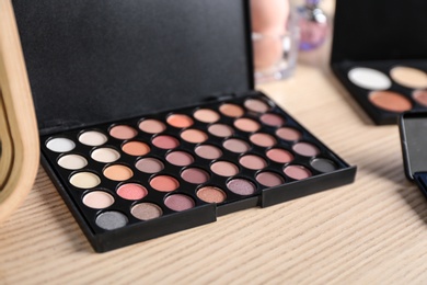 Photo of Large eye shadow palette on dressing table