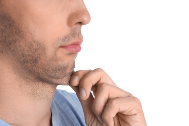 Young man with double chin on white background, closeup