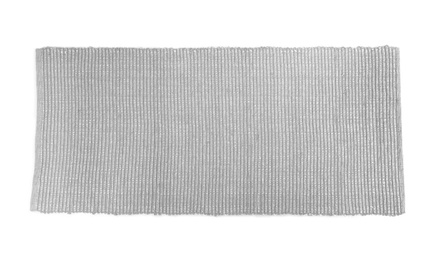 Photo of Grey carpet on white background, top view. Interior element