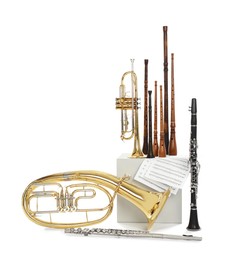 Photo of Set of wind musical instruments on white background