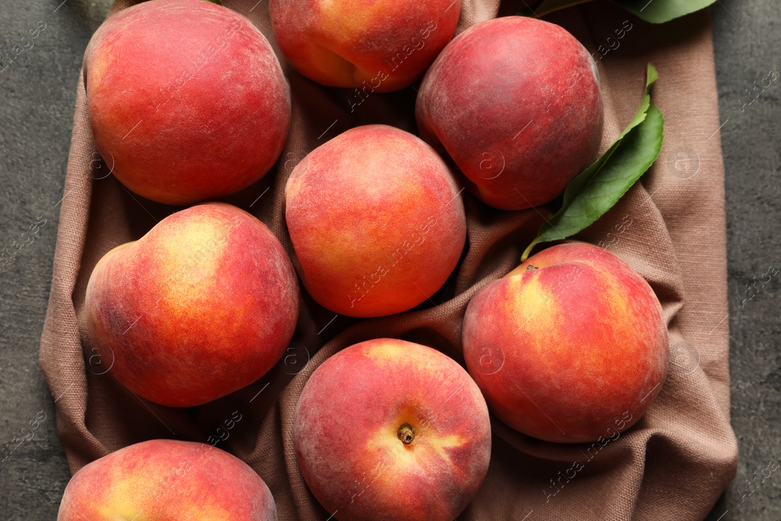 Photo of Fresh sweet peaches on table, top view