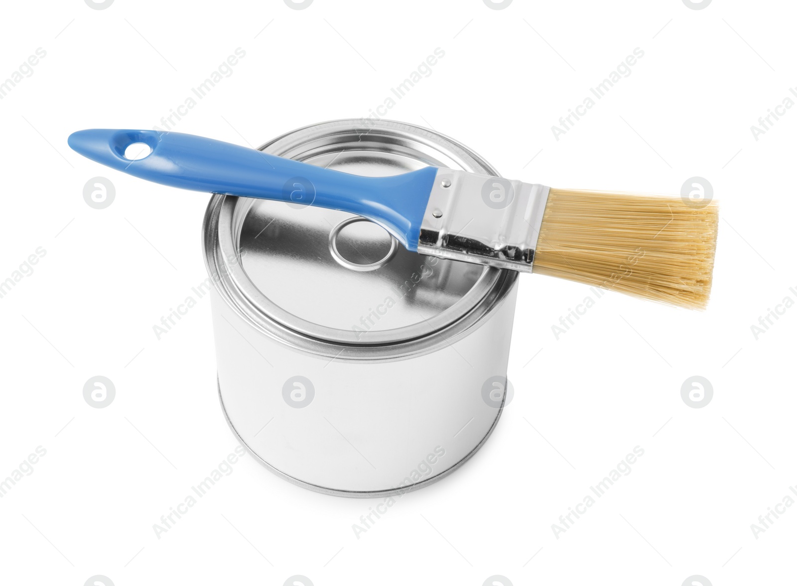 Photo of New metal paint can and brush on white background