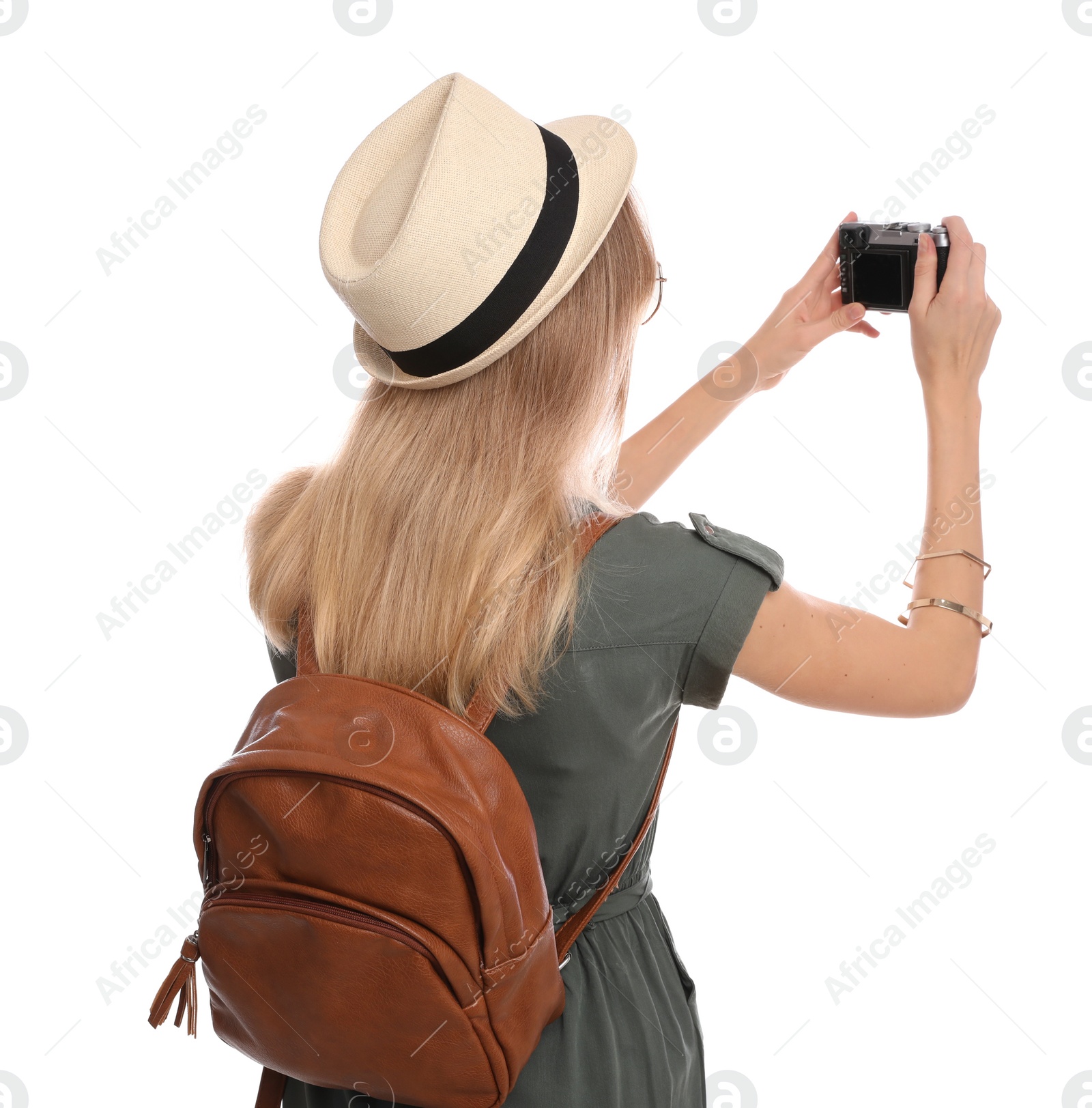 Photo of Woman with backpack taking picture on white background. Summer travel