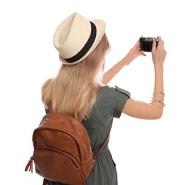 Woman with backpack taking picture on white background. Summer travel