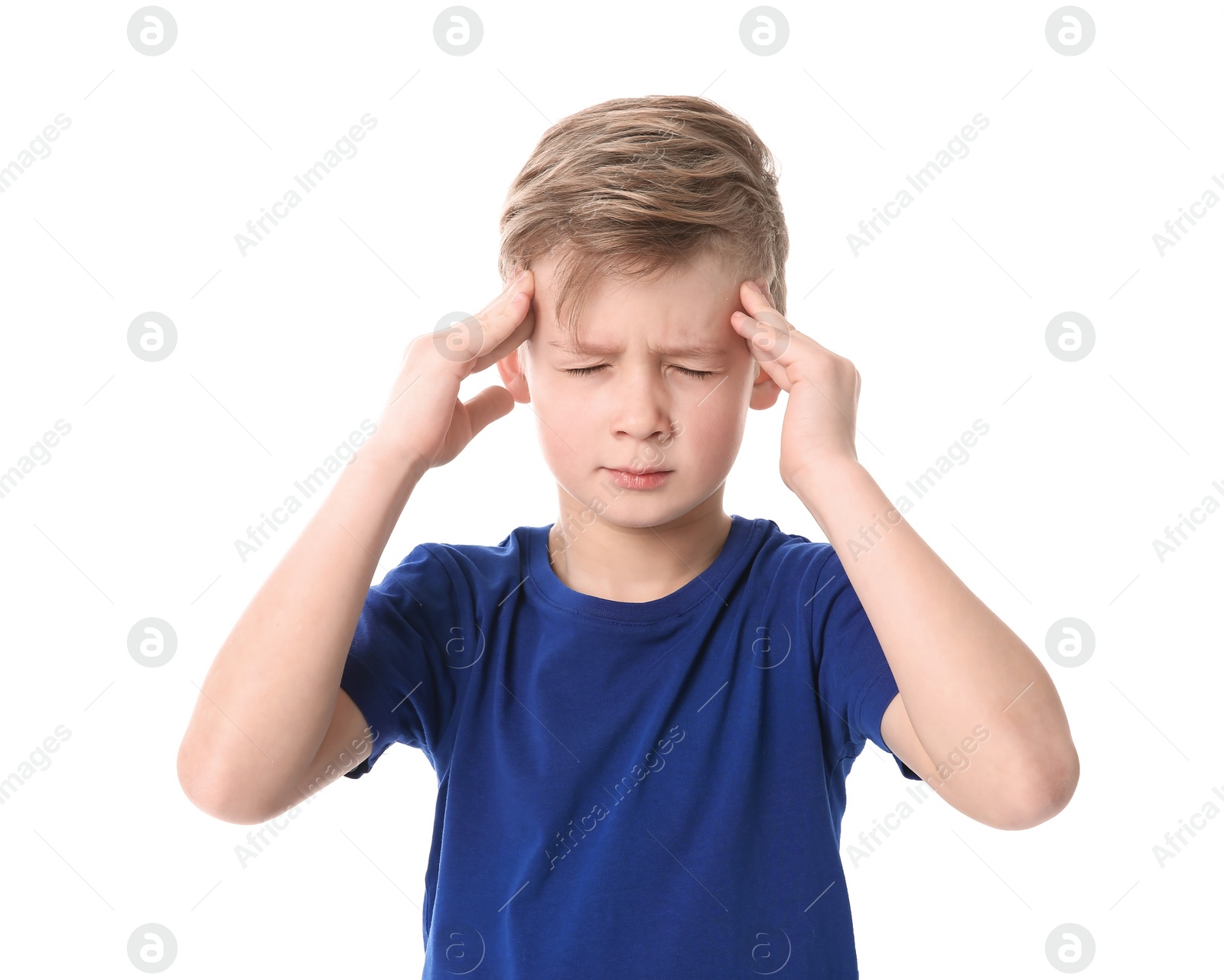 Photo of Little boy suffering from headache on white background