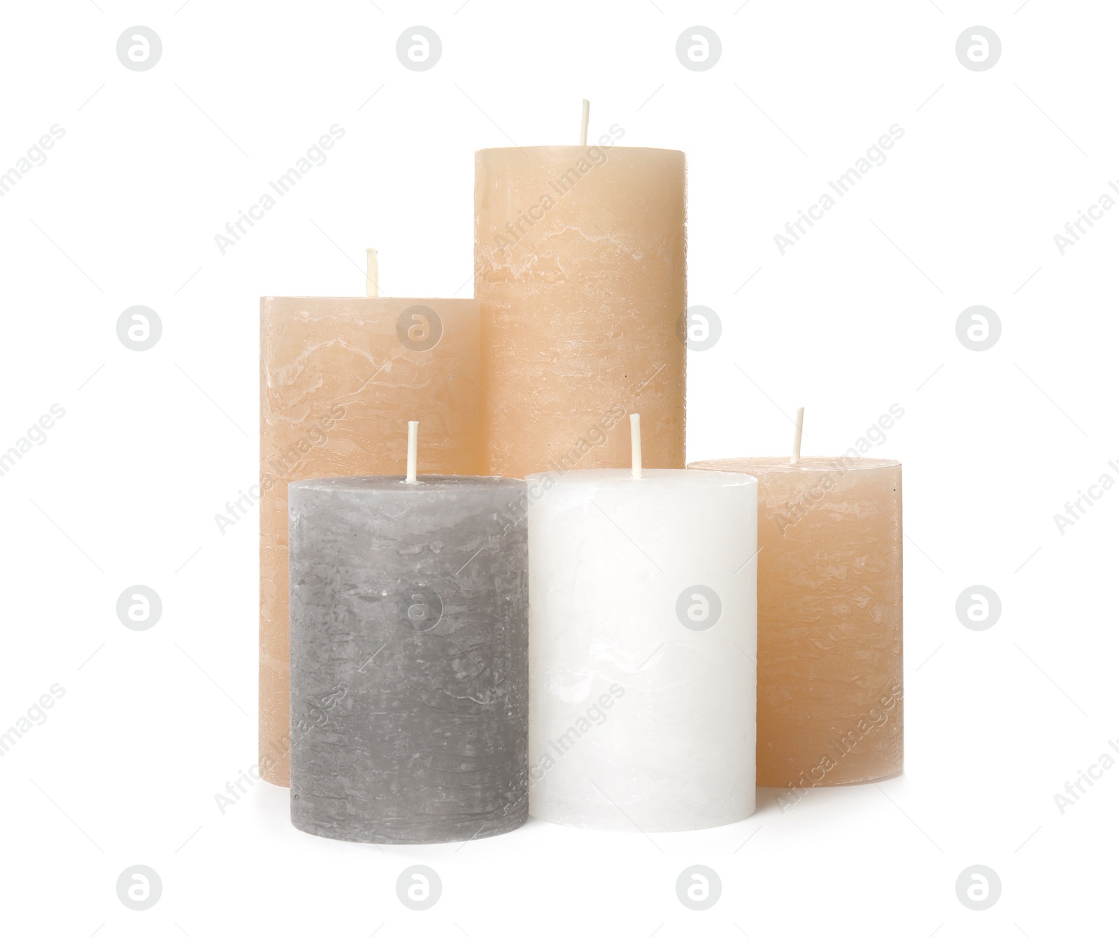 Photo of Many color wax candles on white background