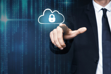 Image of Cyber security concept. Businessman touching cloud with padlock illustration, closeup